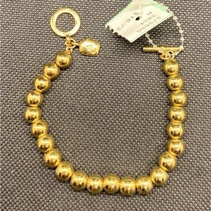 Gold tone heavy bracelet